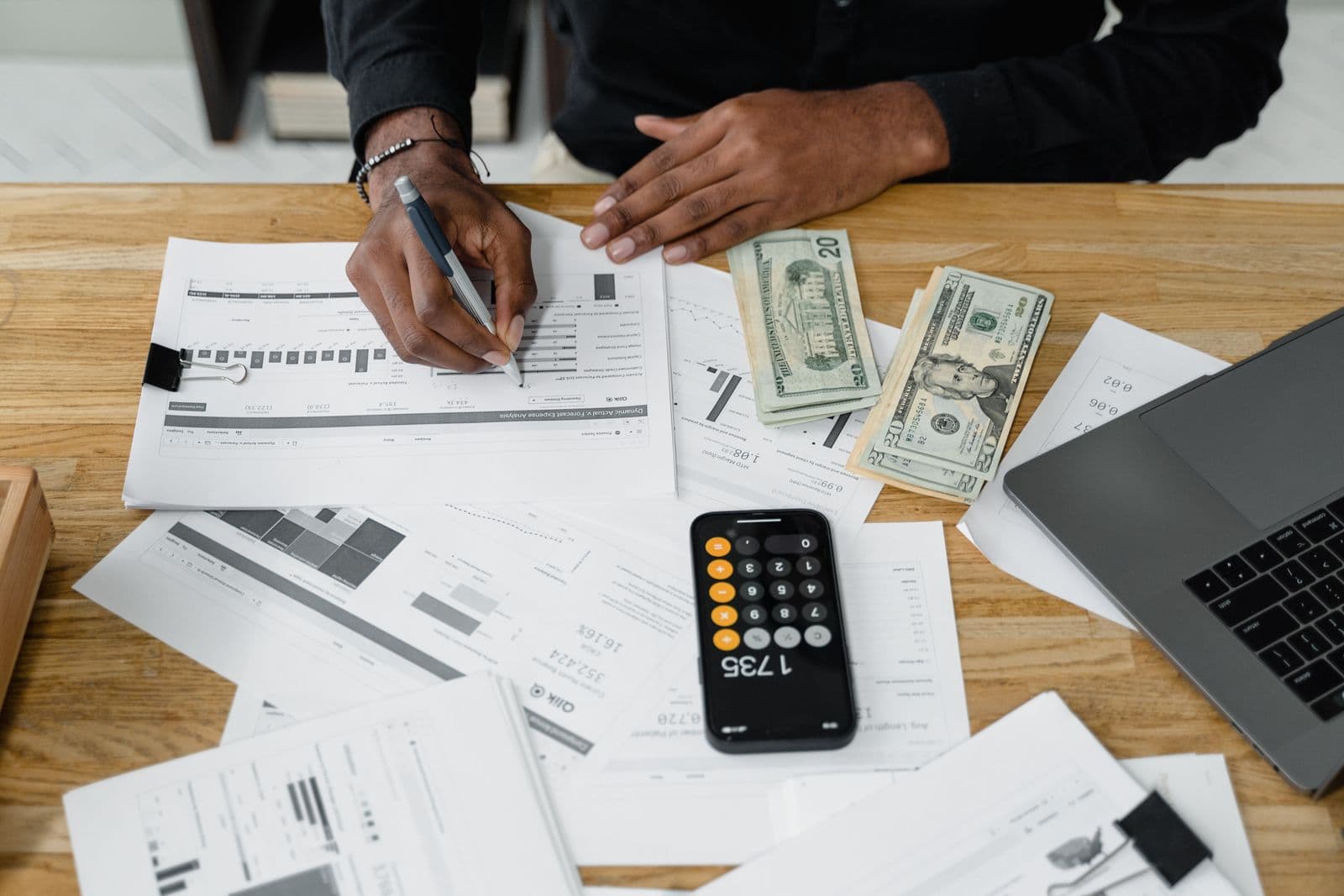 Reviewing financial documents at a desk