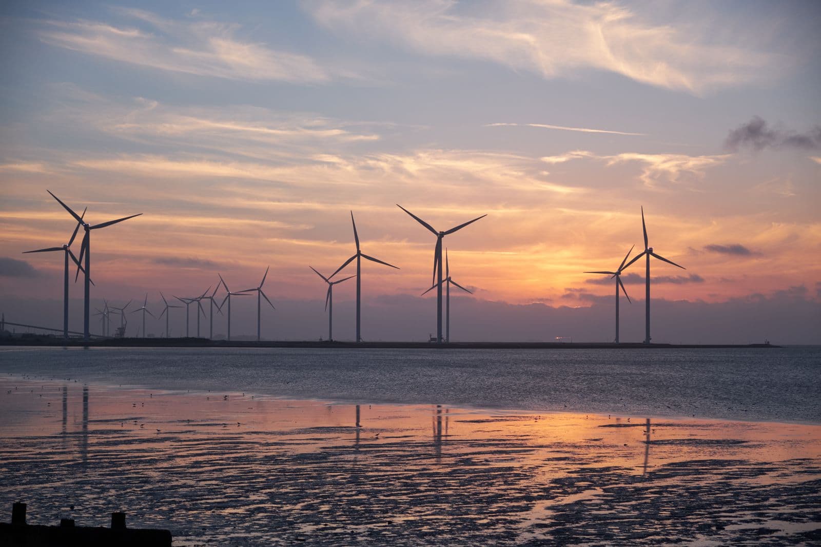 Wind turbines at sunset