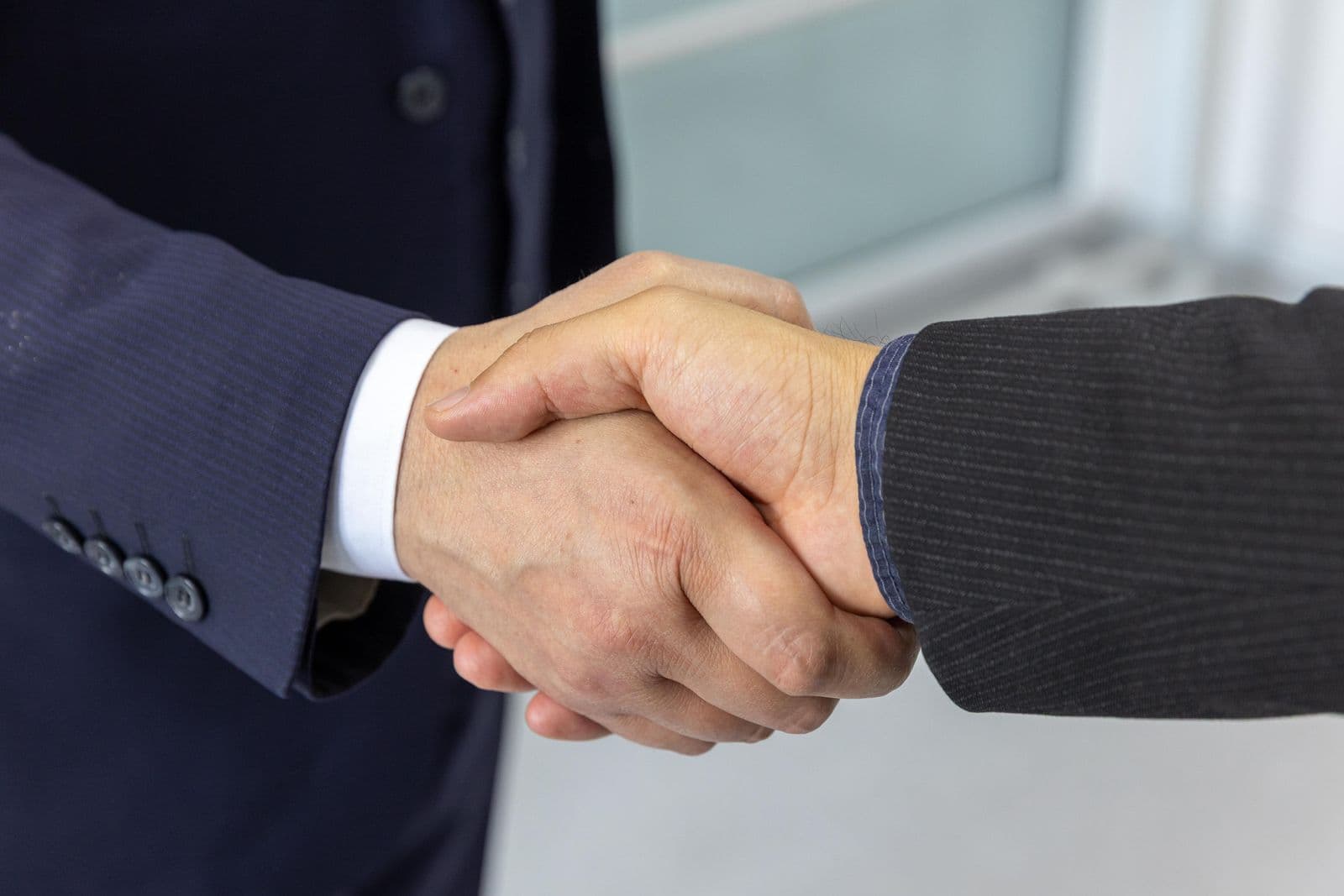 Business partners shaking hands